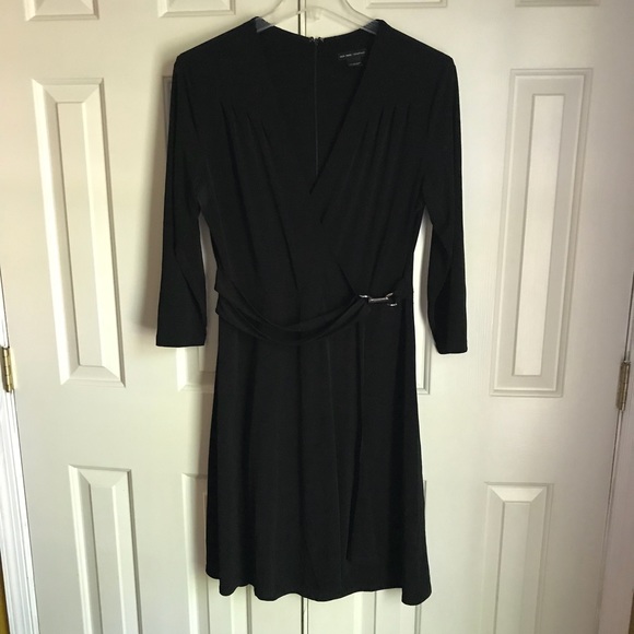 New York & Company Dresses & Skirts - Figure flattering faux wrap black dress